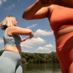 side-view-women-exercising-together_23-2149622982