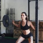 woman-lifting-barbell-gym_1048944-20161368